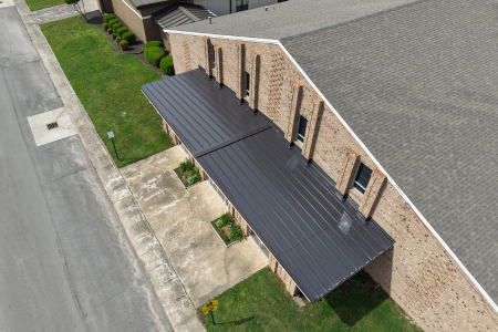 black metal awning over door