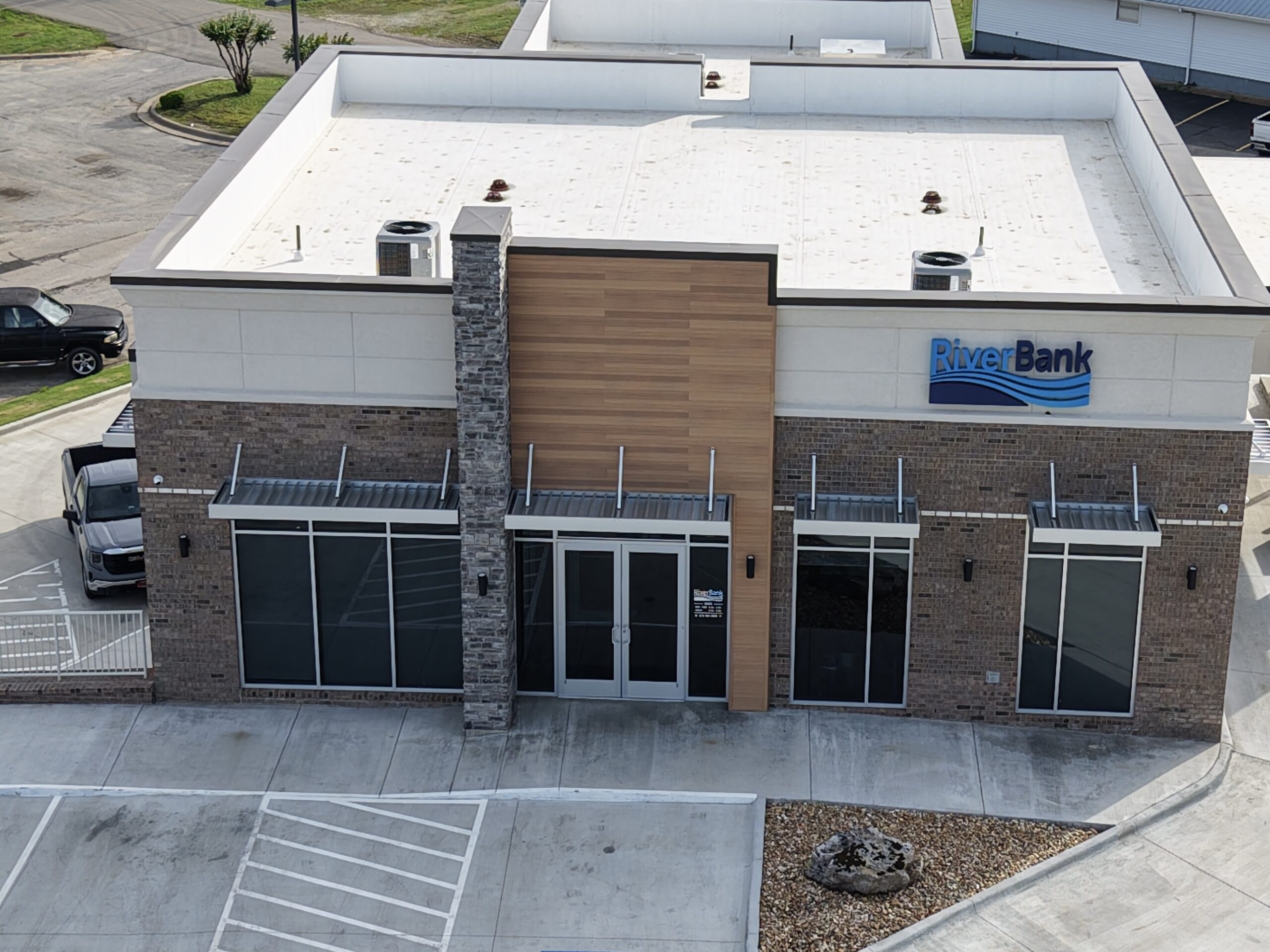aluminum window awnings on commercial building